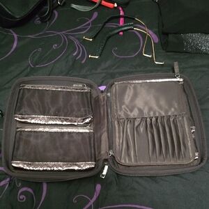 Laura Mercier makeup bag.